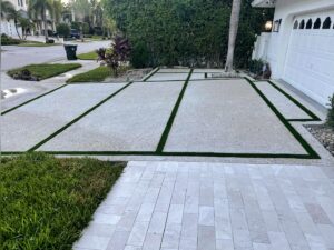 Exposed Aggregate Driveway with Grass Chases & Marble Walks