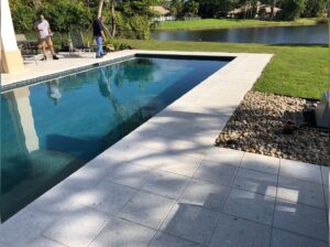 Pooldeck with Artistic Pavers Shellock Ivory & Coping