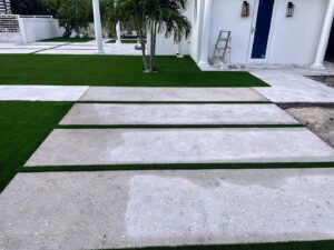 Shell Broadcast Concrete with Grass Chases & Marble